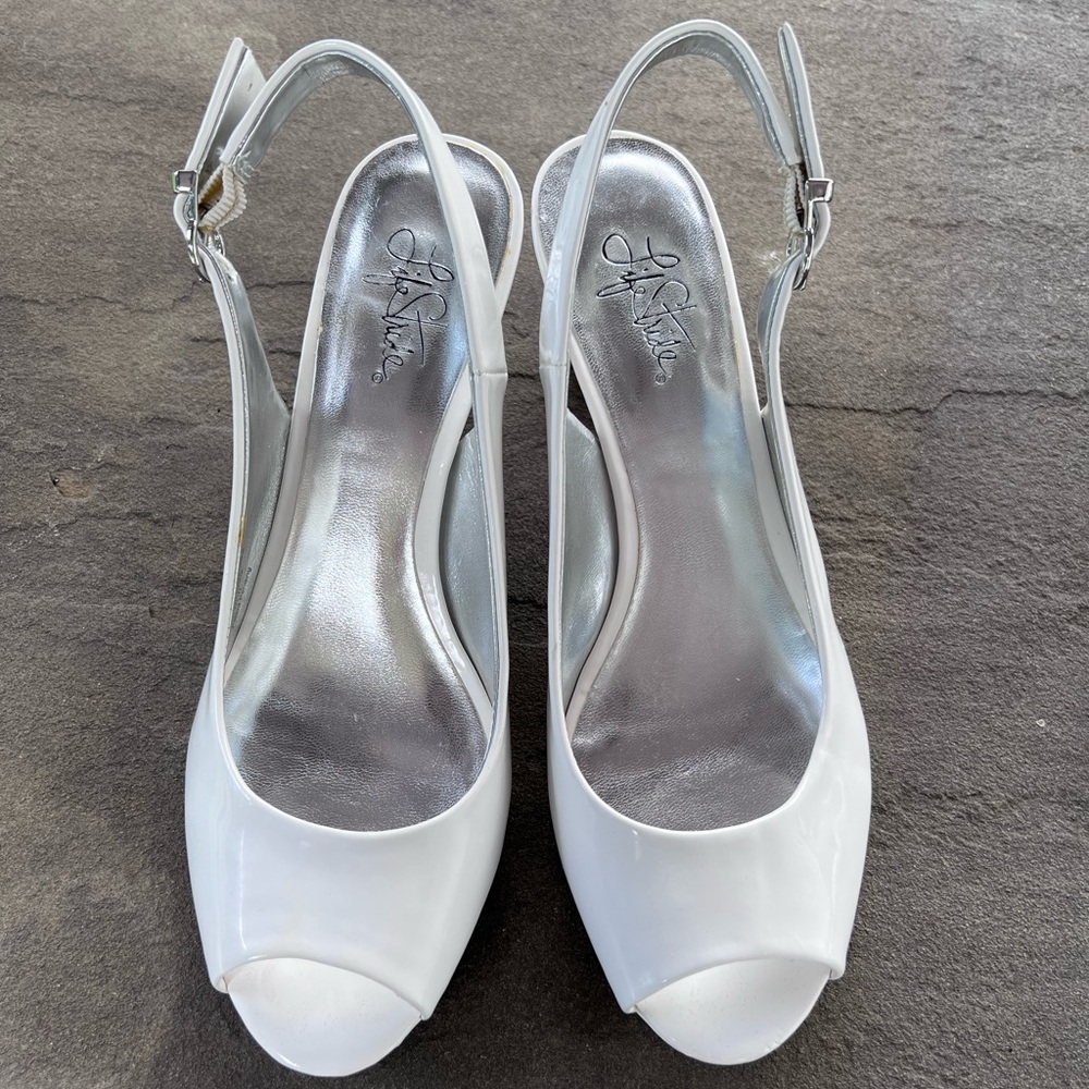 Life Stride. Never out of style! Peek a boo toe, white patent leather shoe.